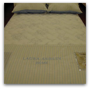 Blue Laura Ashley mattress at Sleepys.